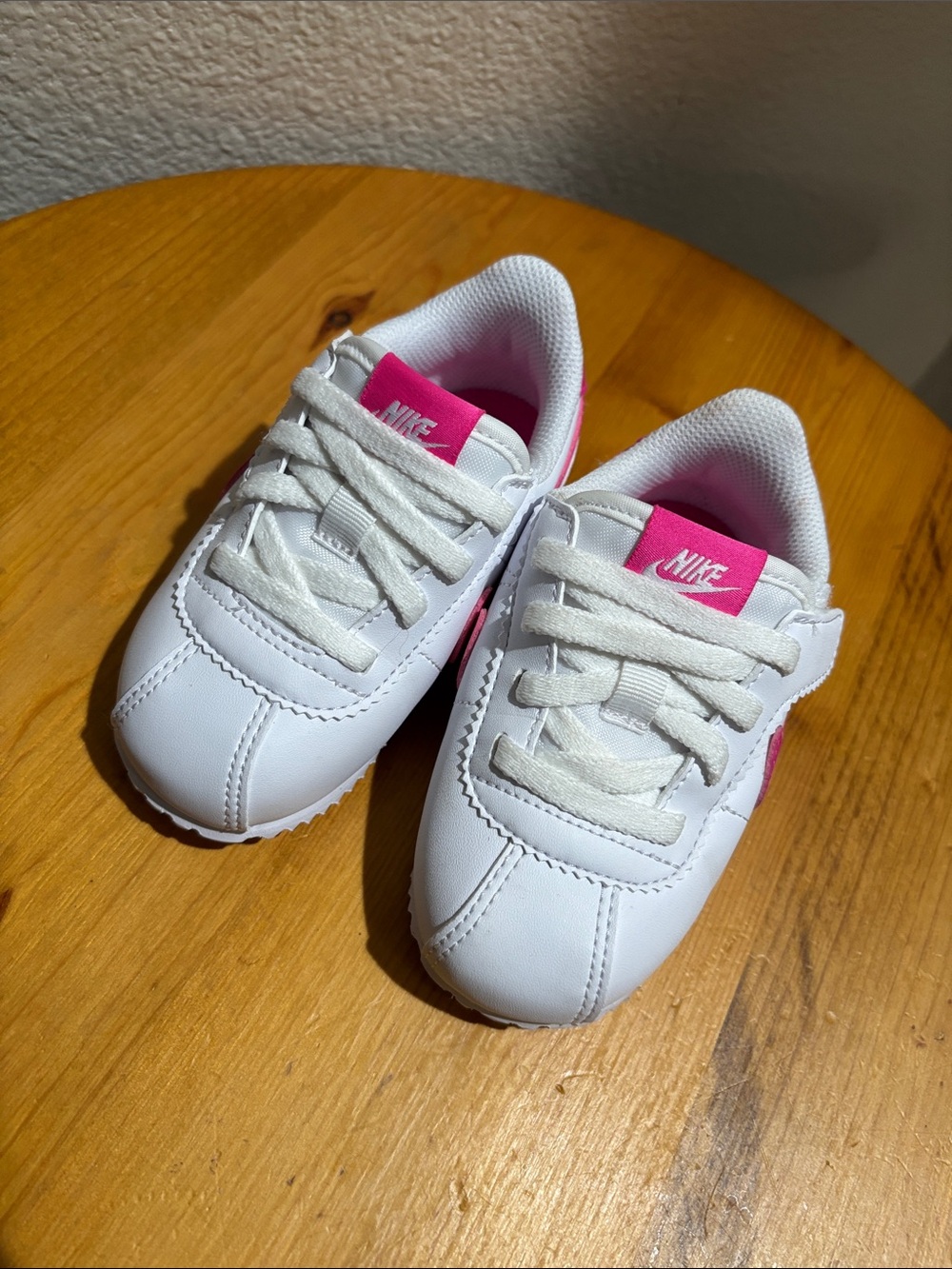 Nike Kids White Sneakers with Pink Accents 7C